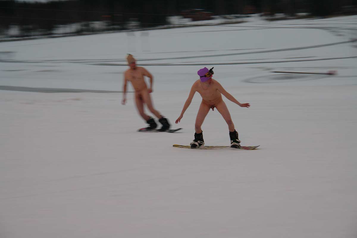 Clothes off festivities - skiing and snowboarding.